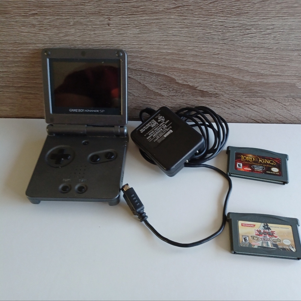 Game Boy Advance SP with Charger and Games